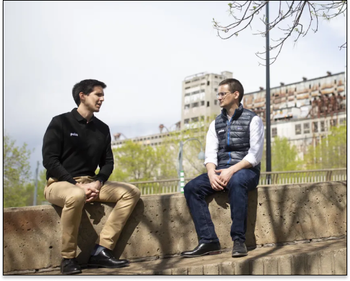 Poka founders sitting outside.